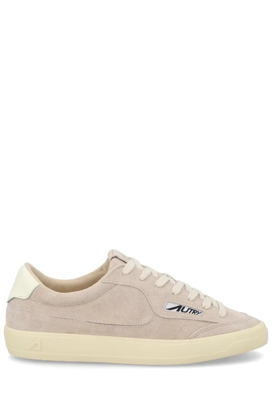 Beige suede autry men’s low-top sneaker with cream laces and sole featuring black autry logo on the side