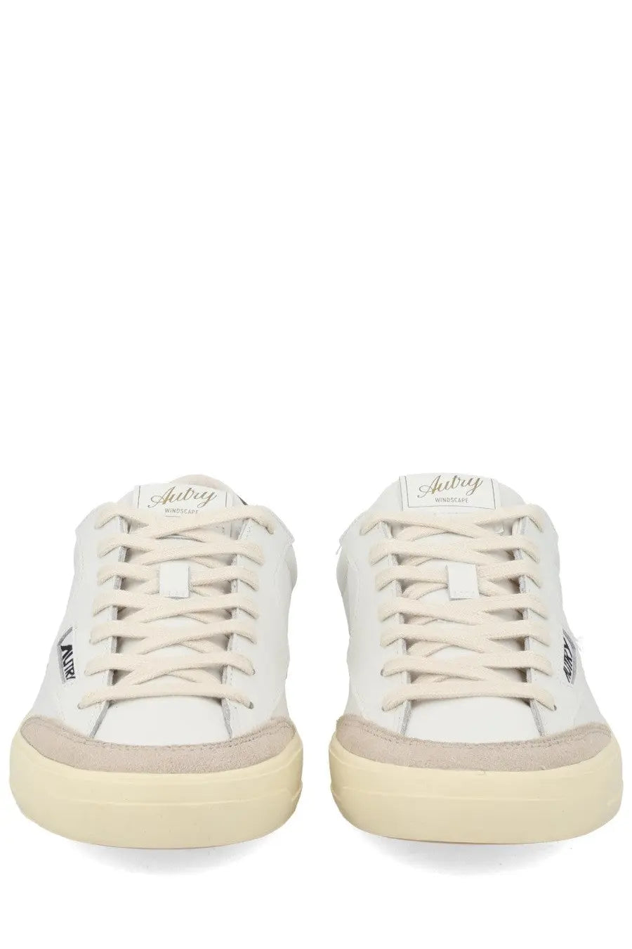 Autry men’s sneaker windscape low white with white leather, beige rubber soles, and matching suede accents in low-top design