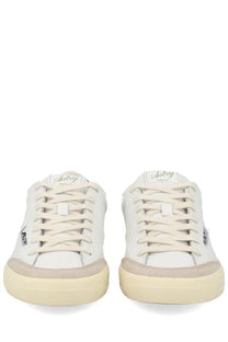 Autry men’s sneaker windscape low white with white leather, beige rubber soles, and matching suede accents in low-top design