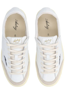 Autry men’s sneaker windscape low white white leather with beige rubber soles and minimalist branding on side and heel
