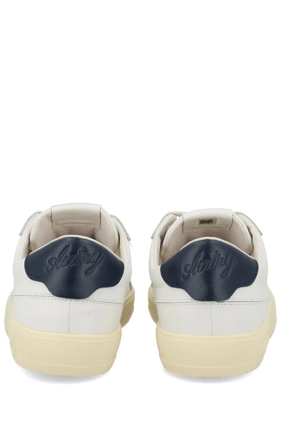 White leather autry men’s windscape low sneakers with navy blue heel tabs featuring souray logo cursive script