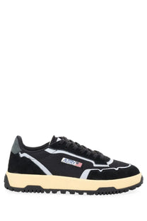 Autry men’s wildpace low sneaker in black suede and mesh with white accents cream rubber sole and american flag logo patch