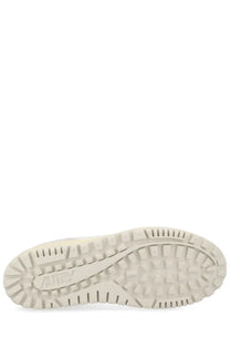 Back side of autry men’s wildpace low sneaker white showing cream-colored rubber sole with textured tread and air logo