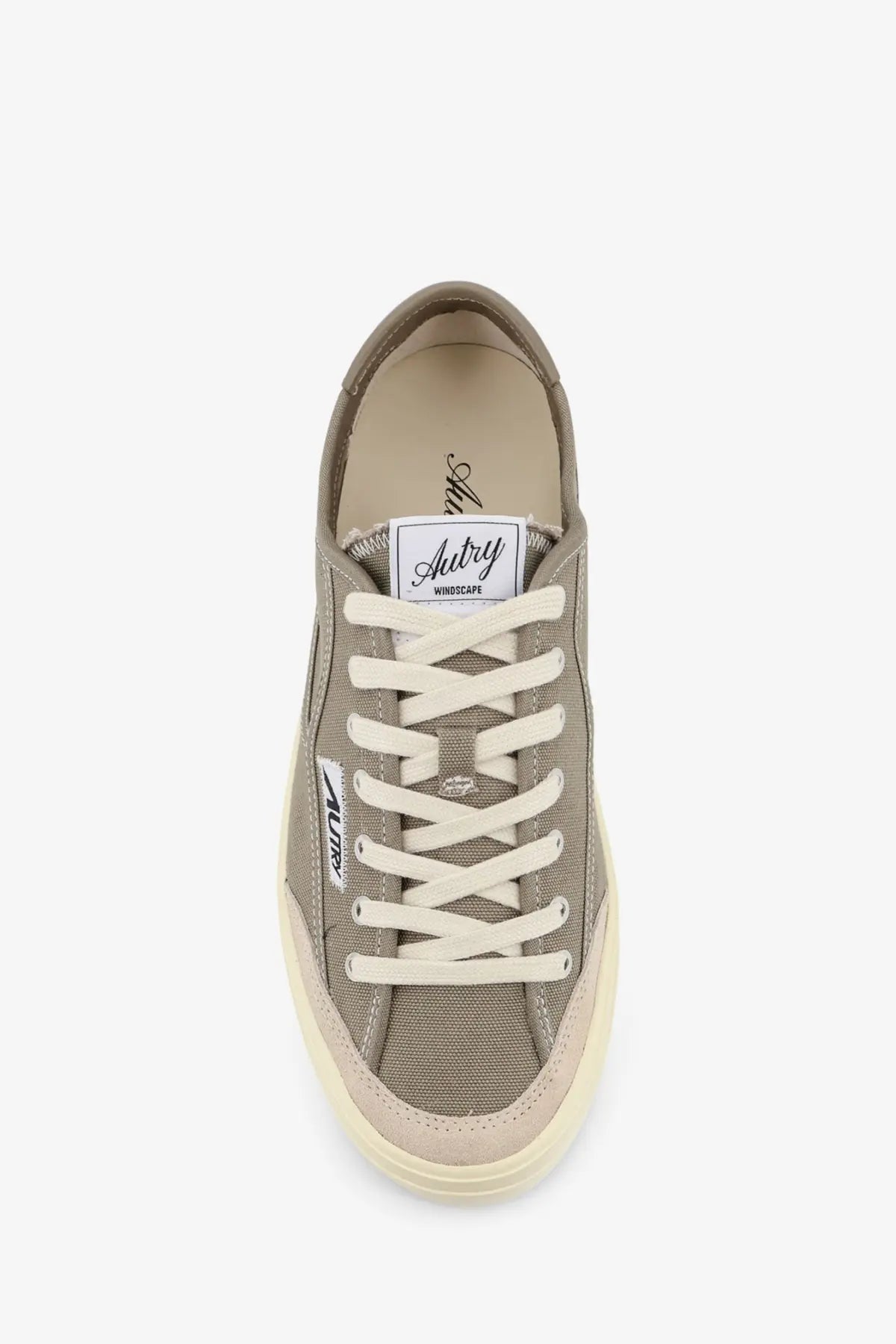 A muted olive canvas sneaker with cream laces and sole by Autry from the Men’s Windscape collection