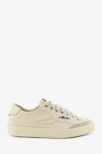 Autry men’s windscape canvas low-top sneaker in cream with subtle logo and matching rubber sole