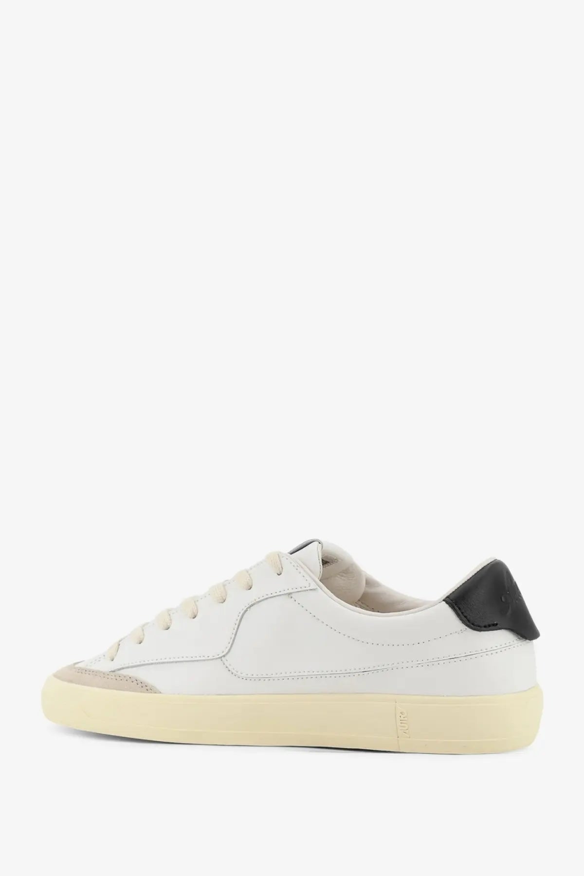 Autry men’s windscape leather sneakers in white with black heel tab and beige rubber sole shown from the back side