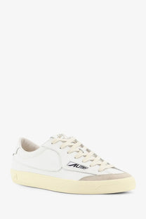 Autry men’s windscape leather sneakers in white with beige suede accents and cream rubber sole featuring autry logo