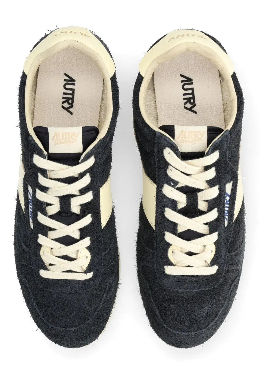 Autry men’s windspin sneaker in black suede with cream laces and side stripes featuring a vintage design