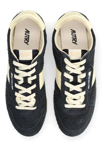 Autry men’s windspin sneaker in black suede with cream laces and side stripes featuring a vintage design