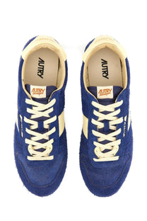 Autry men’s windspin sneaker in royal blue suede with cream laces and side panels featuring a retro design