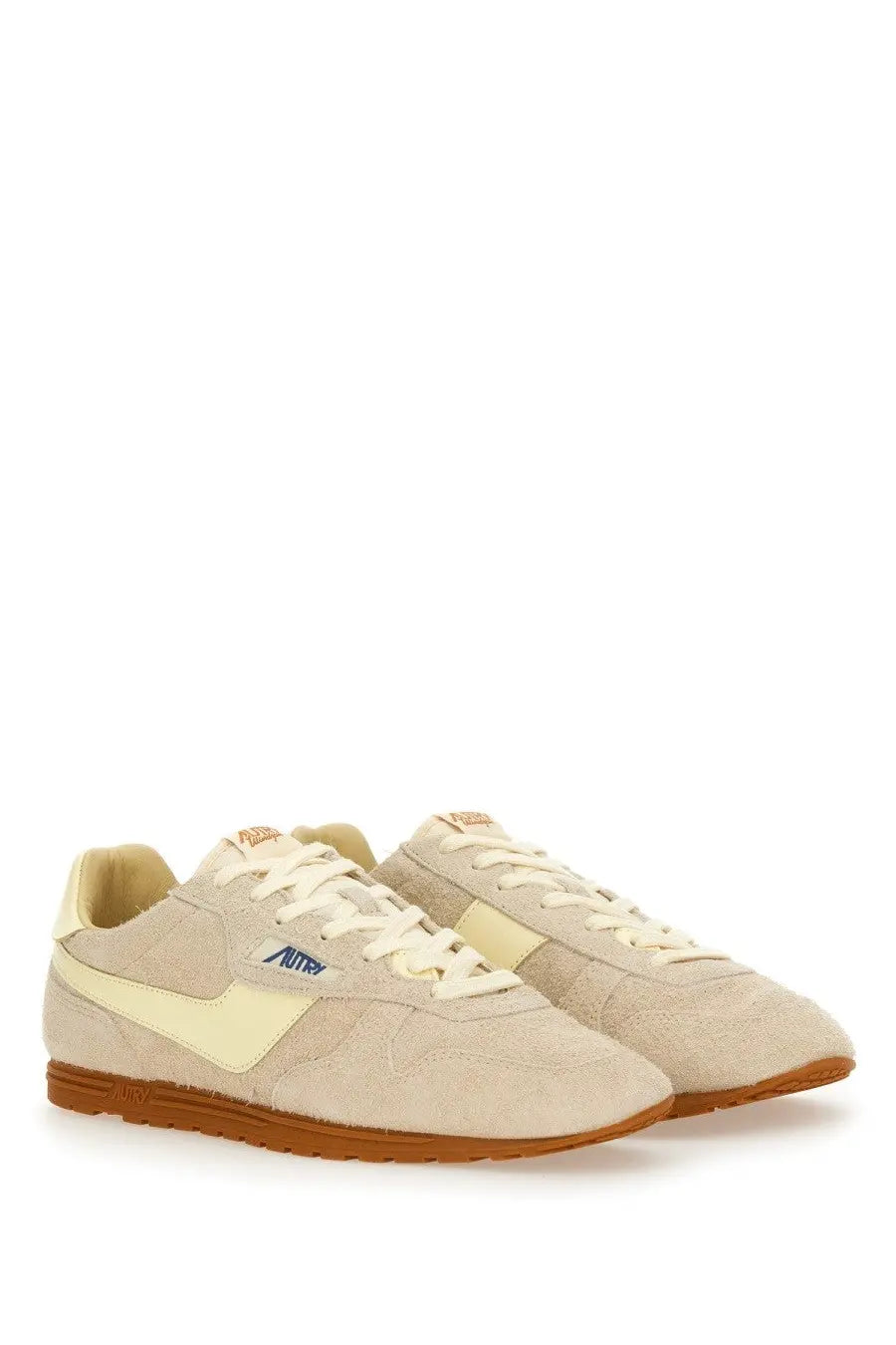 Autry men’s windspin sneaker in beige suede with cream swoosh brown rubber sole and amer logo on the side