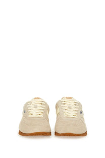 Autry men’s windspin sneaker cream-colored suede low-top with tan rubber soles and matching laces