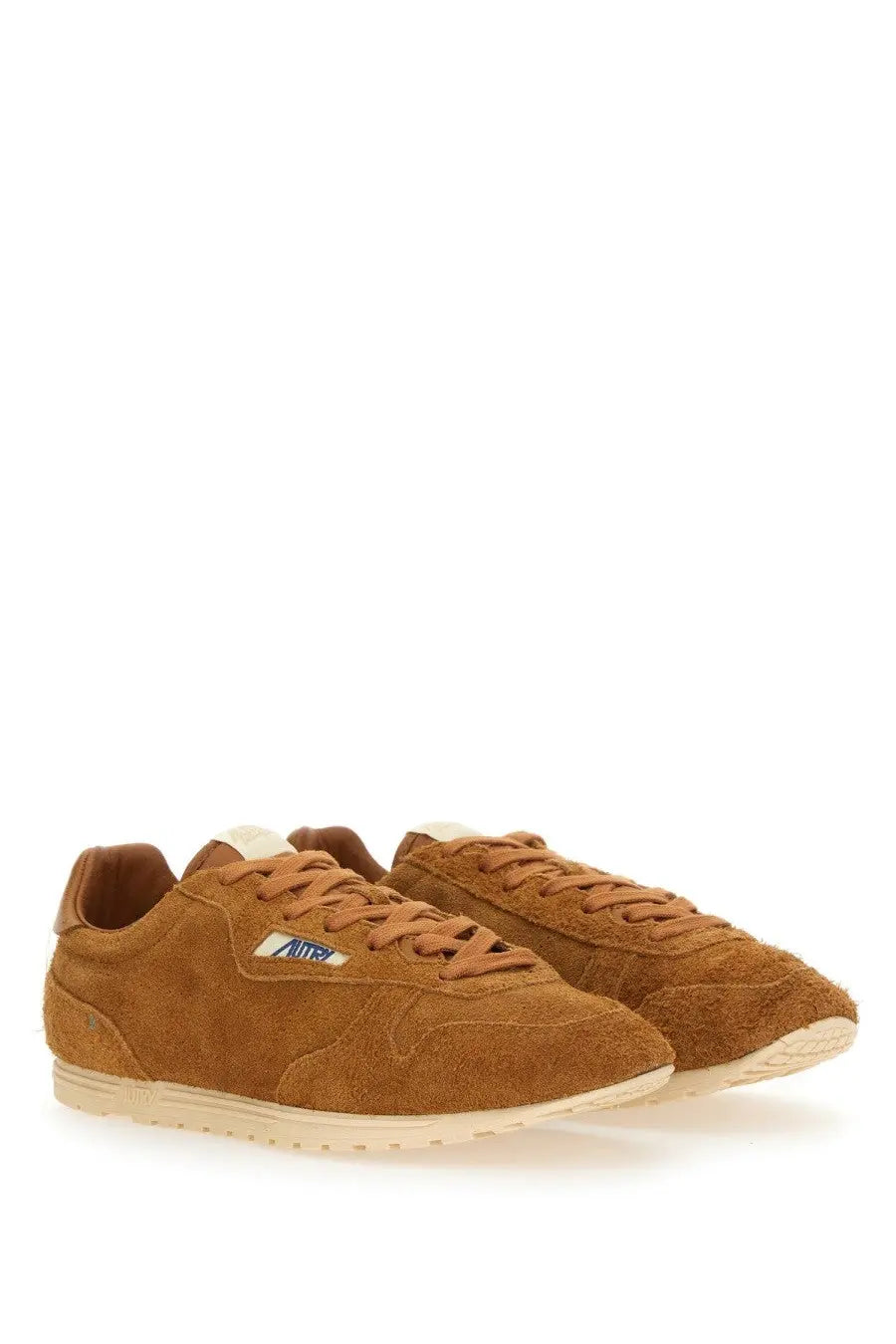 Autry men’s windspin sneaker tan suede with white rubber sole tan laces and blue white side logo