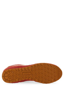 Autry men’s Windspin sneaker in red suede with tan rubber sole and distinctive triangular tread pattern