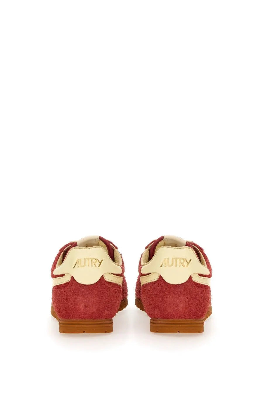 Back view of autry men’s windspin sneaker in red suede with cream accents and tan rubber sole featuring gold branding