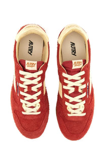 Autry men’s windspin sneaker red suede with cream laces and accents featuring the autry brand name on the insole