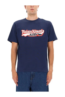 Navy blue maison kitsuné autry unisex t-shirt with red and white logo featuring brand name and black fox silhouette