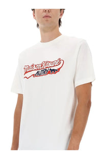 White cotton unisex t-shirt with bold red and navy blue maison kitsuné autry logo and stylized fox silhouette