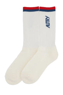 Autry unisex white ribbed crew socks with red navy striped cuffs and navy embroidered logo on the side