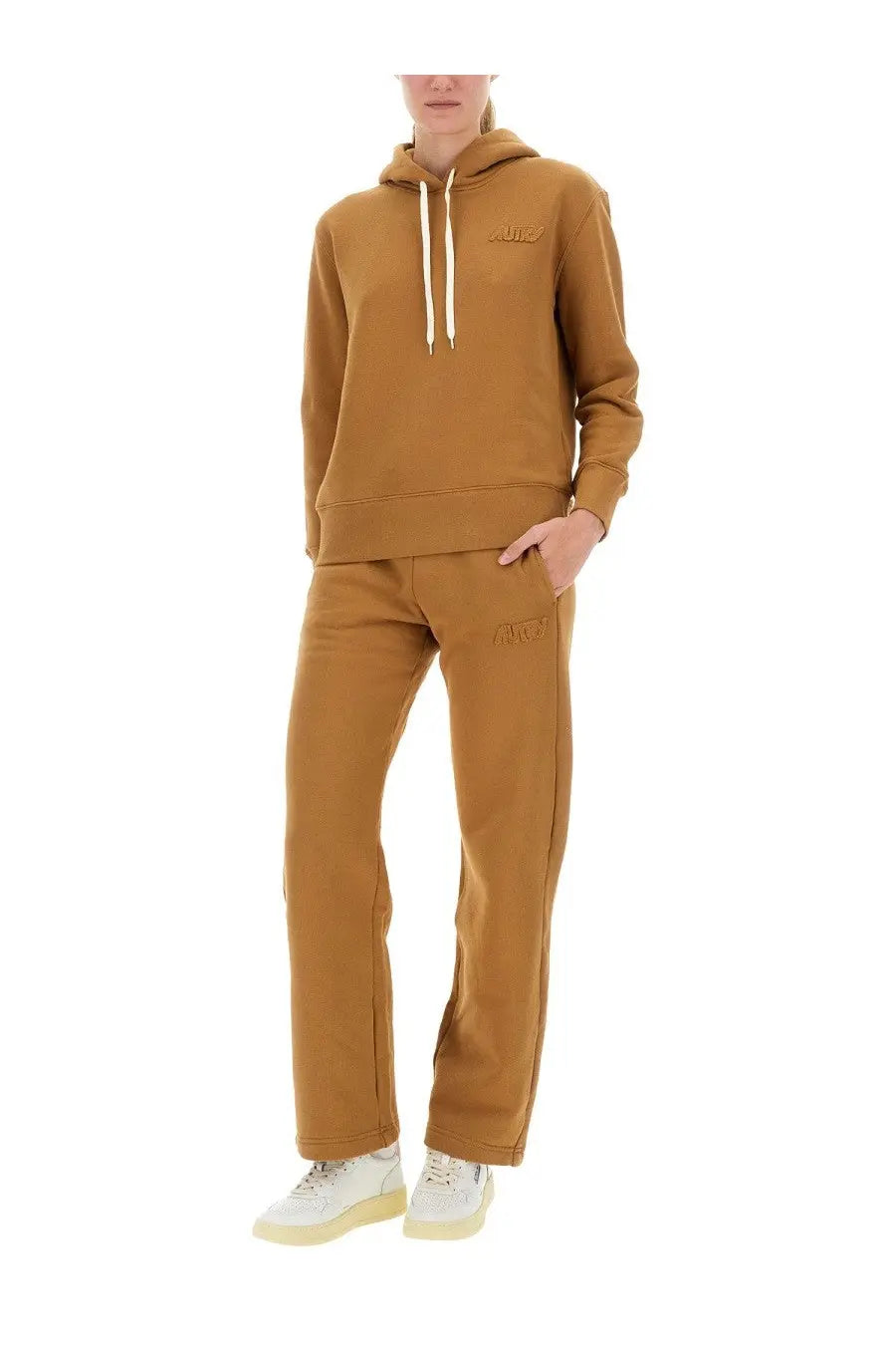 Autry women’s hooded sweatshirt brown set in cozy mustard yellow with embroidered branding on chest and side pockets