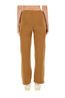 Autry women’s jogger pants in brown featuring tan relaxed-fit sweatpants with elastic waistband and ribbed cuffs