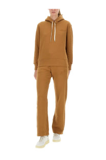 Autry women’s jogger pants brown made of tan cotton with white drawstrings and subtle embroidered chest logo