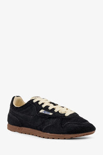 Autry women’s low top windspin pony skin sneakers in black suede with cream laces tan rubber sole and nirv logo