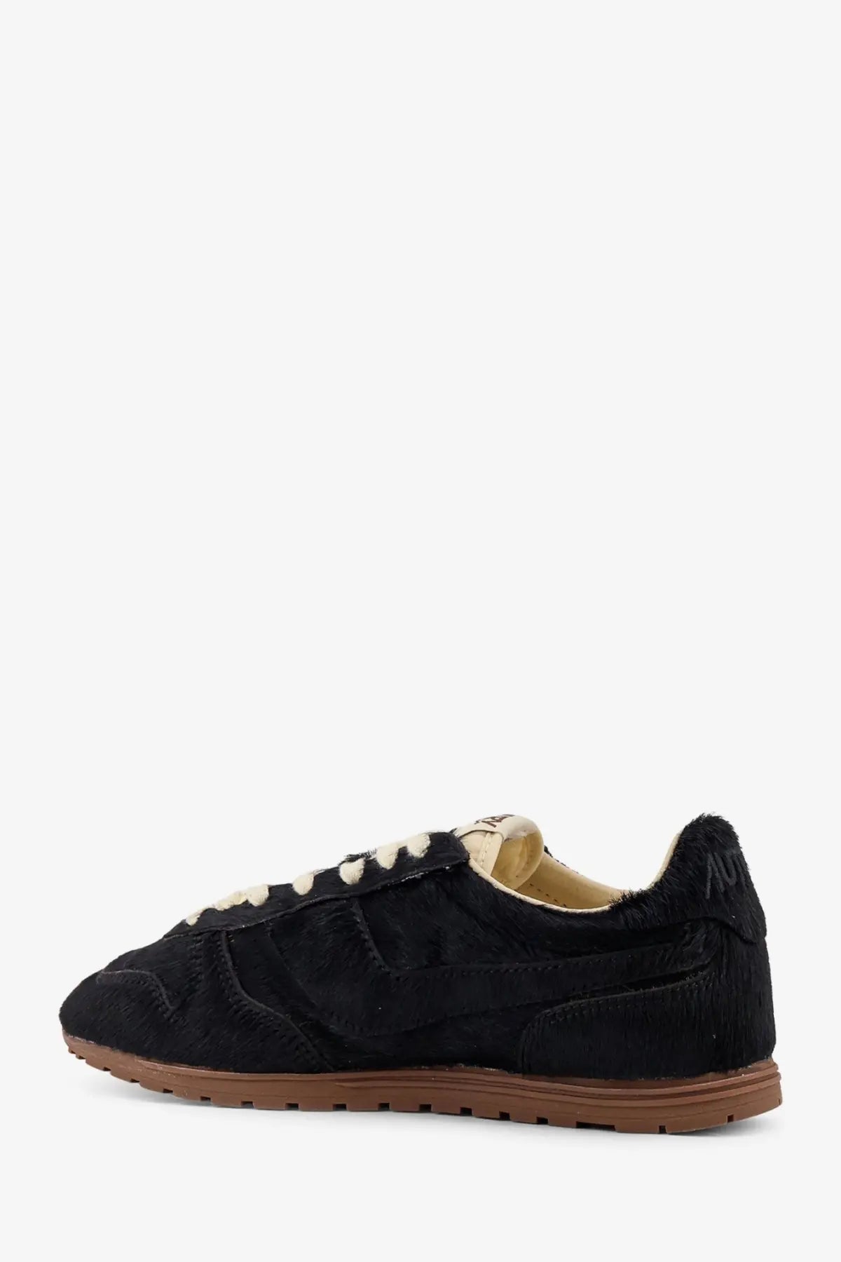 Autry women’s low top windspin black suede sneaker with cream laces and tan rubber sole front view