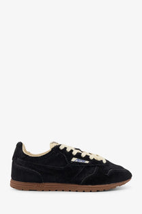 Autry women’s low top windspin pony skin sneakers in black suede with cream laces and tan rubber sole featuring the logo