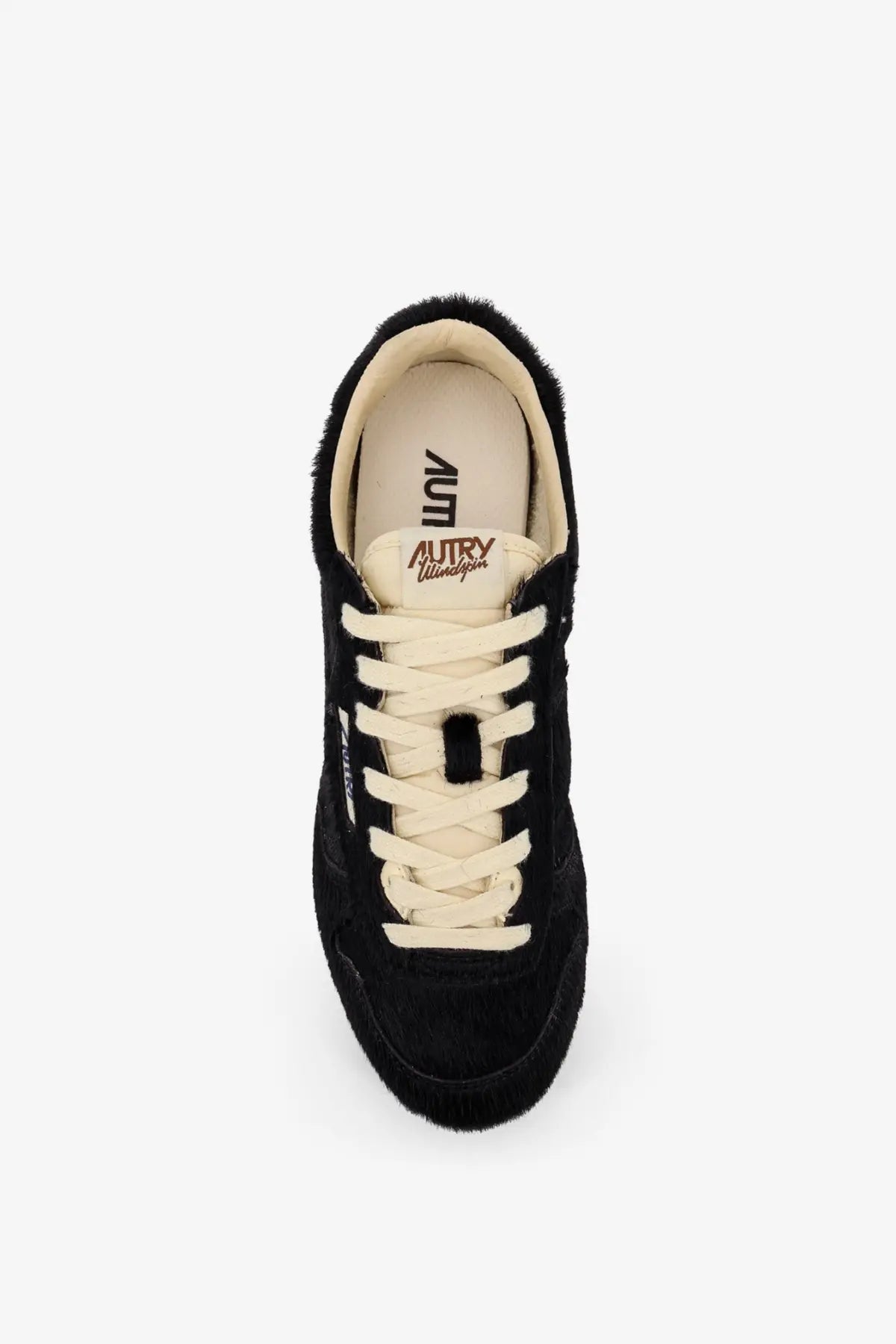 Autry women’s low top windspin pony skin sneaker in black suede with cream laces and plush fuzzy collar trim