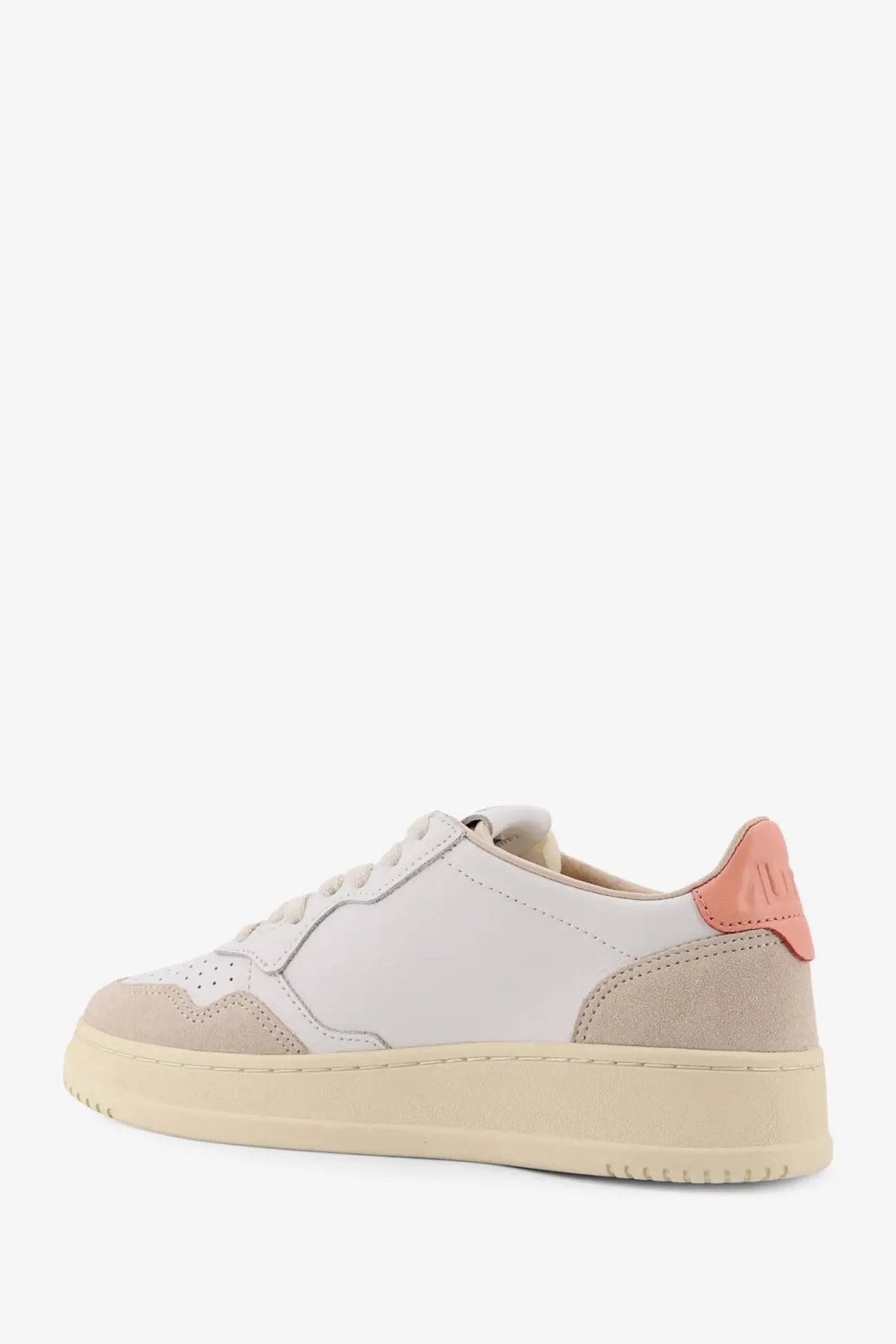 Autry women’s medalist leather sneaker in white and beige with a pink heel tab shown from the back side
