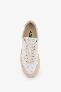 Autry women’s Medalist leather sneakers in white with beige perforated leather detailing and branding on the tongue