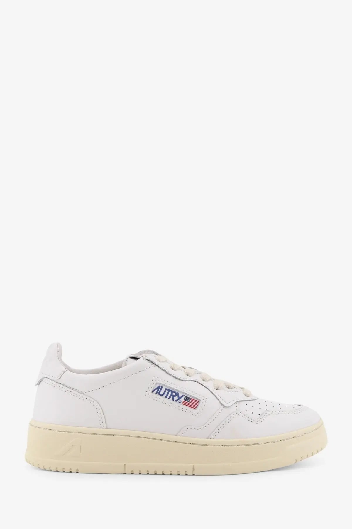 Autry women’s medalist white leather sneaker with cream rubber sole and american flag logo patch