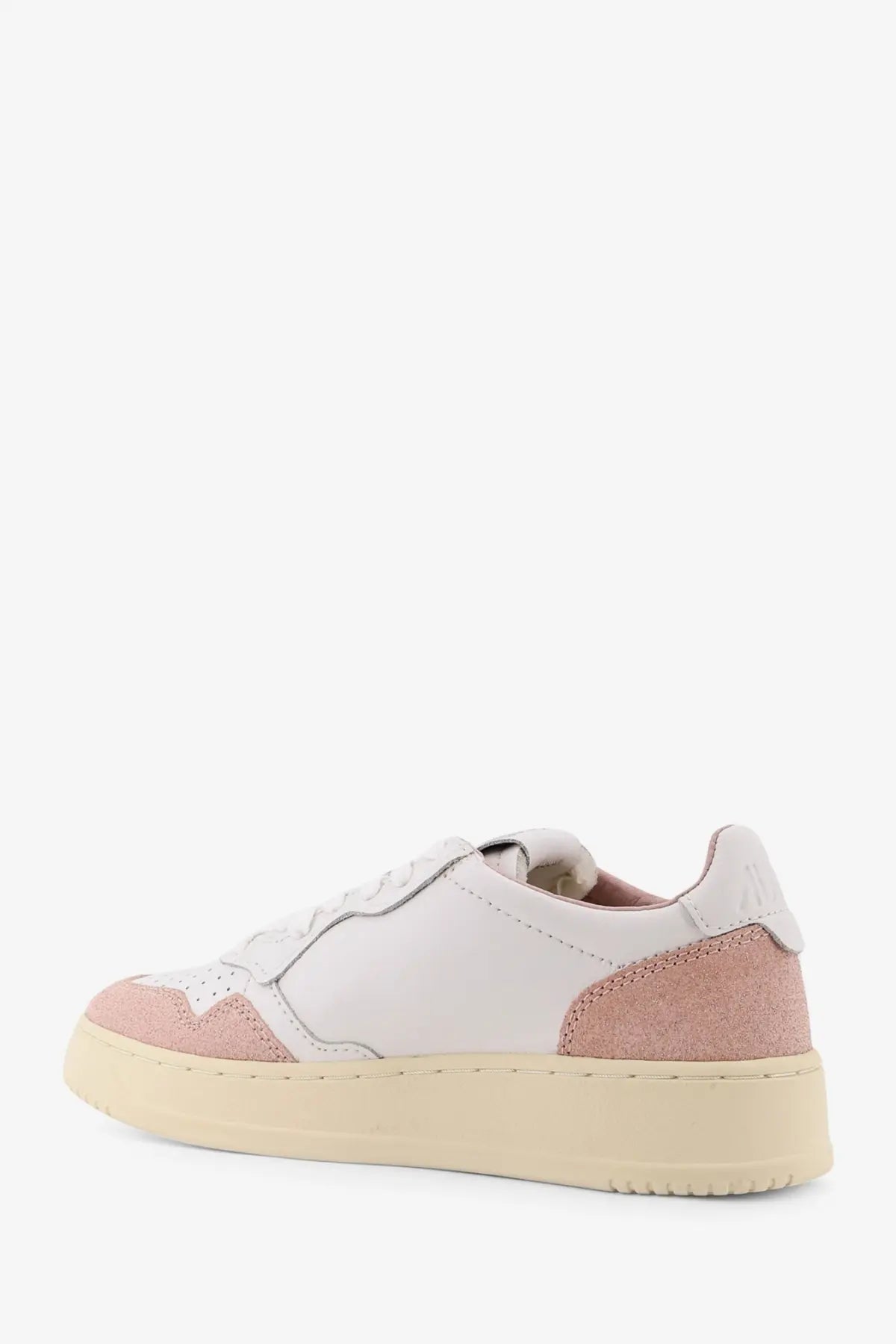 Autry women’s Medalist low leather sneaker in white and blush pink suede with cream rubber sole