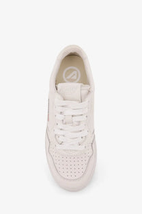 Autry women’s medalist low leather sneaker in white with perforated toe box and subtle tongue branding