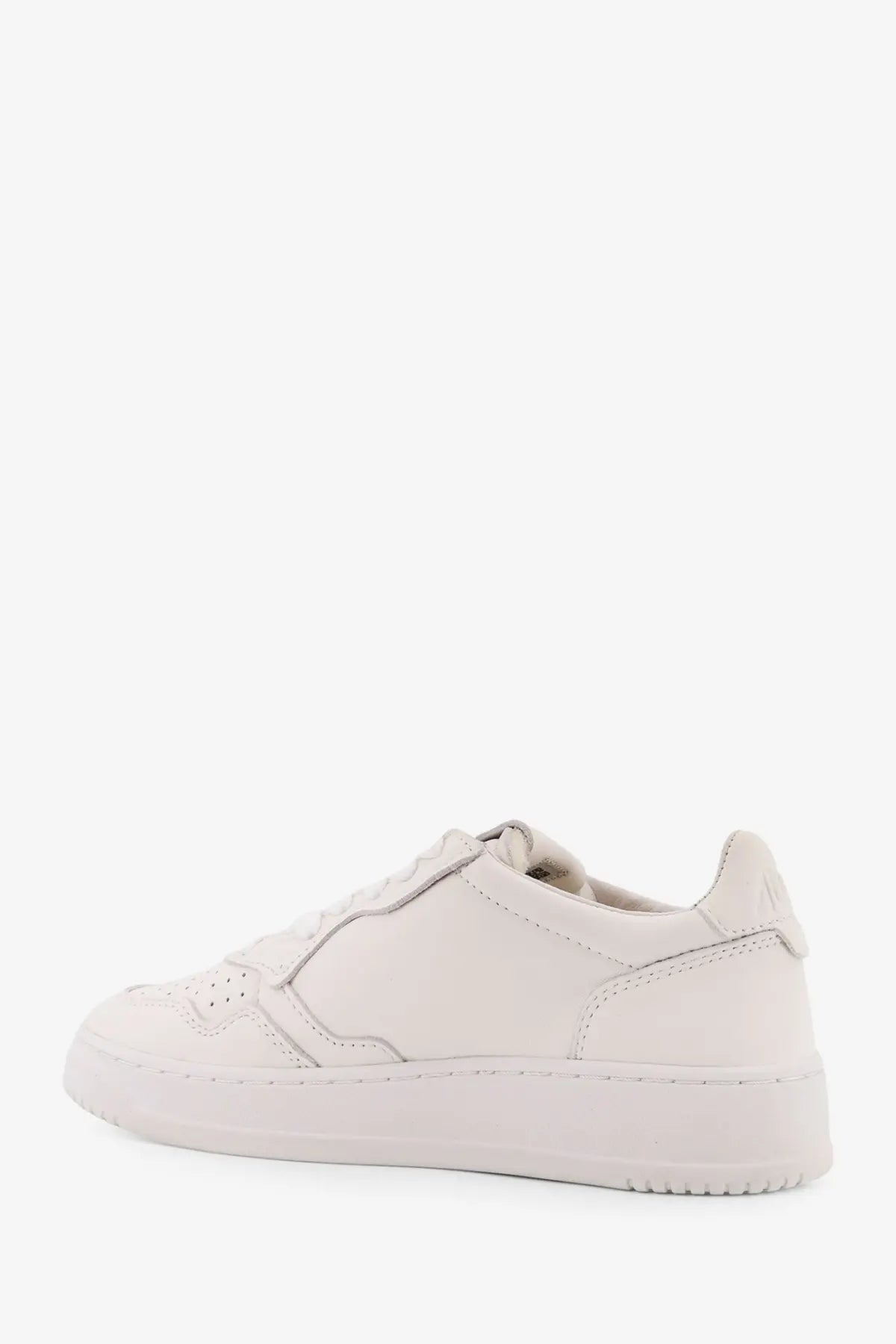 Autry women’s medalist low leather sneaker in white with clean stitching and chunky sole