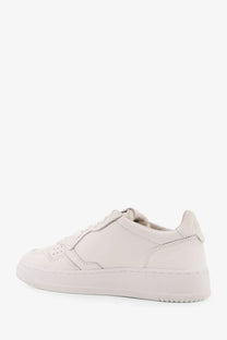 Autry women’s medalist low leather sneaker in white with clean stitching and chunky sole