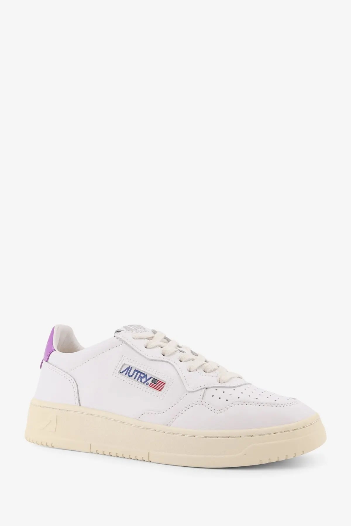 Autry women’s medalist low leather sneaker in white with purple heel tab and american flag embroidered logo on cream sole