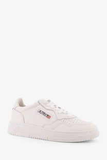 Autry women’s medalist low leather sneakers white with white leather low-top and subtle logo patch on the side