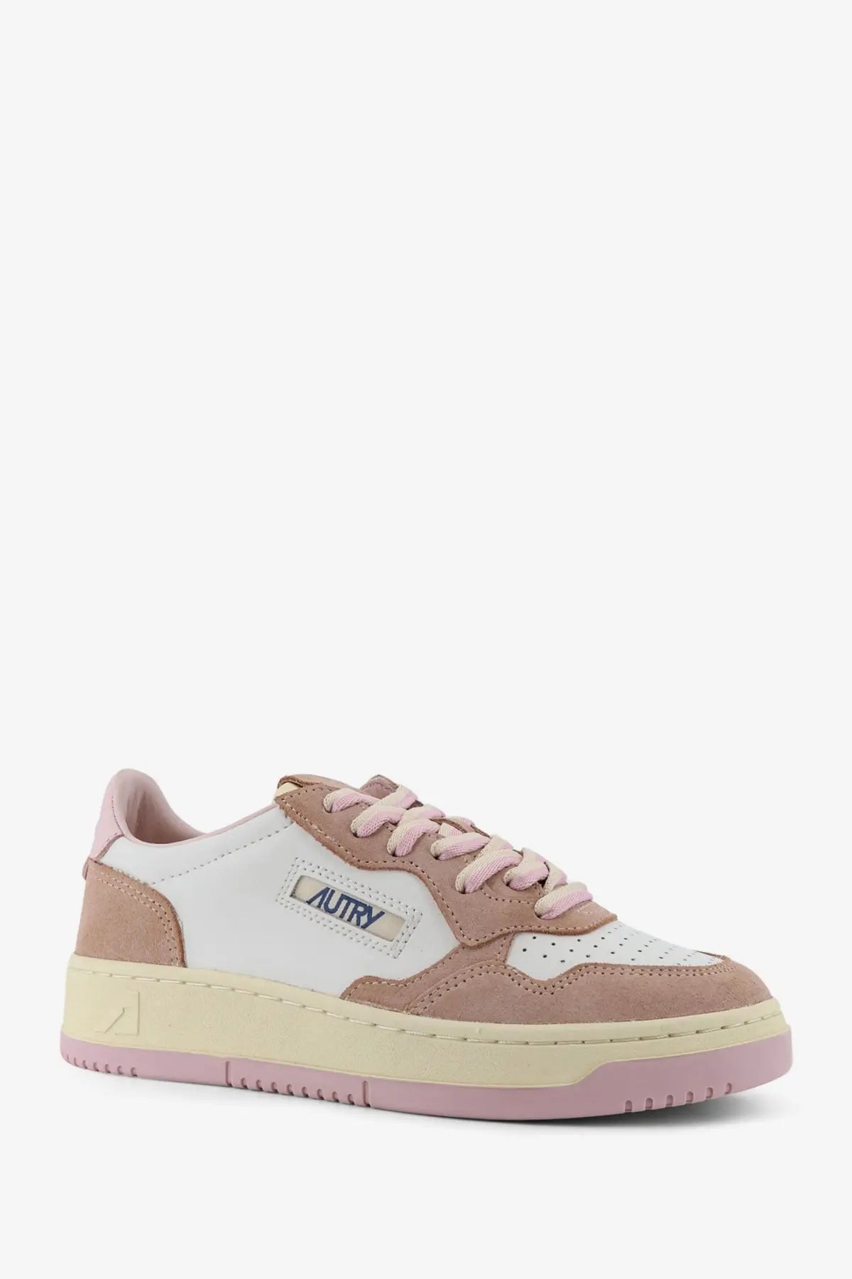 Autry women’s medalist low leather and suede sneaker in pastel pink and white with cream rubber sole