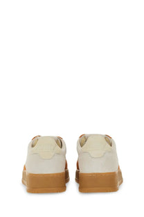 Autry women’s medalist low sneaker in cream suede with tan rubber soles and matching stitching