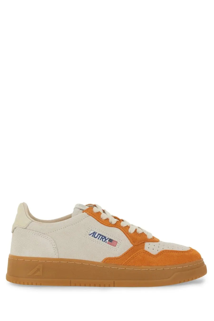 Autry women’s medalist low sneaker in cream and orange suede with gum rubber sole and blue embroidered logo on side