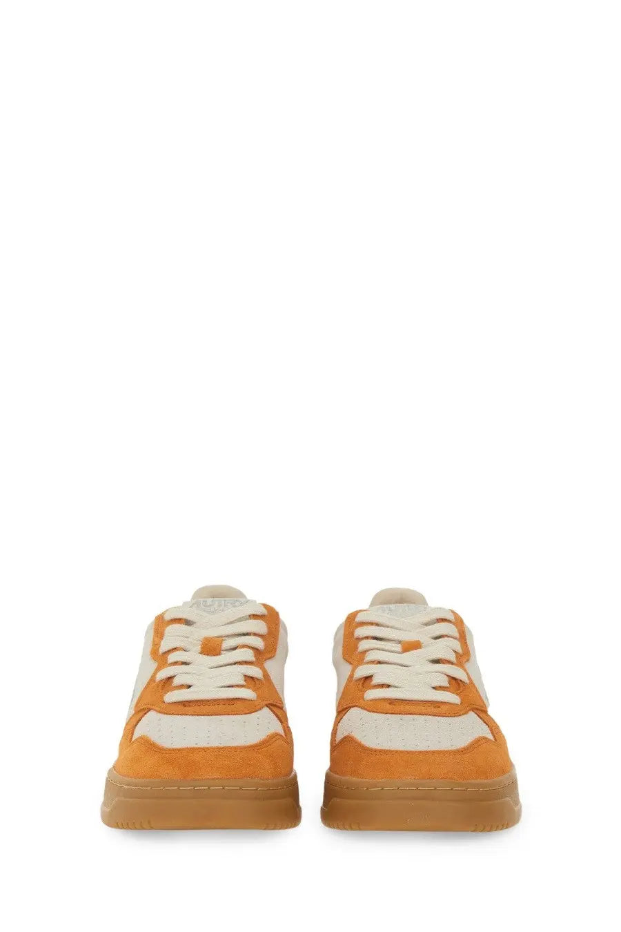 Autry women’s medalist low sneaker in orange and white suede with a gum rubber sole for casual wear