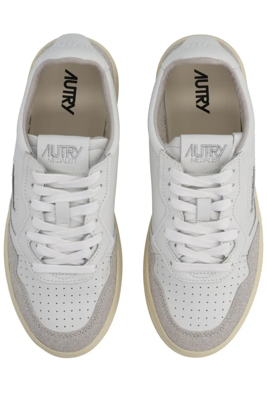 Autry women’s medalist low sneaker in white with beige perforated leather uppers and suede accents