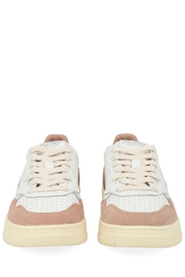 Autry women’s Medalist low sneaker in white and beige suede and leather with perforated detailing