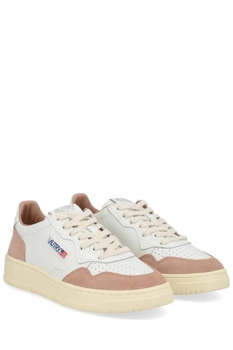 Autry women’s medalist low sneaker in white with beige suede and leather perforated toe box and cream rubber sole