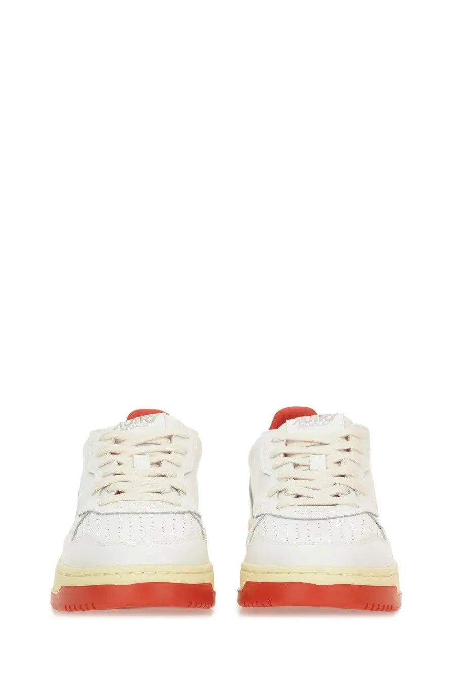 Autry women’s medalist low sneaker white leather with red accents on heel tab and sole shown from back side