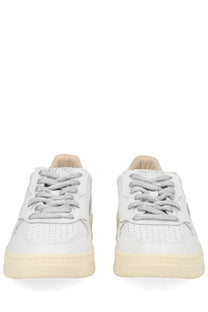 Autry women’s medalist low sneaker white leather with silver glitter laces and cream-colored rubber sole