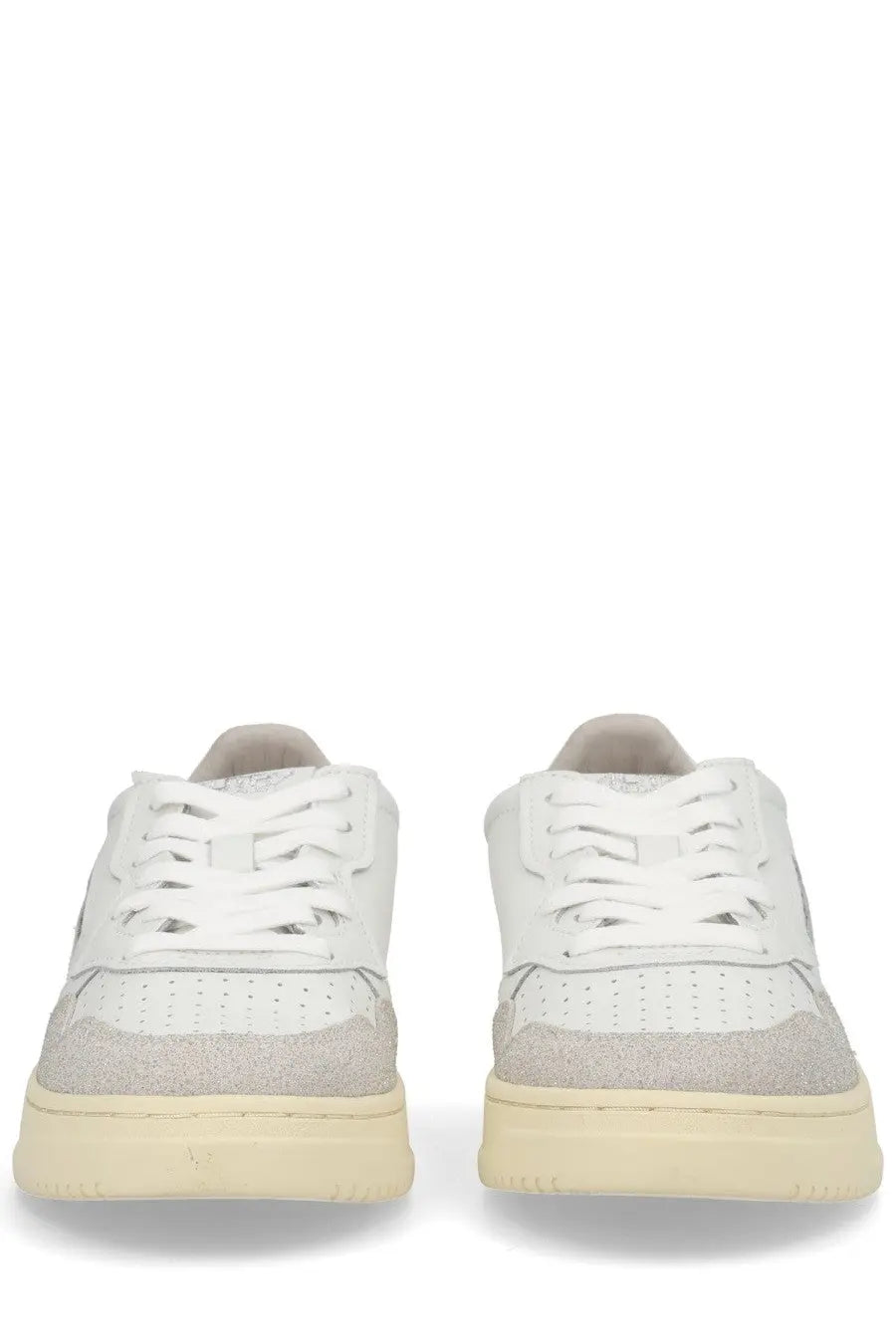 Autry women’s medalist low sneaker in white with light gray suede and perforated toe box detailing