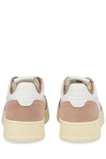 Autry women’s medalist low sneaker in beige and white suede with a chunky cream sole for casual wear